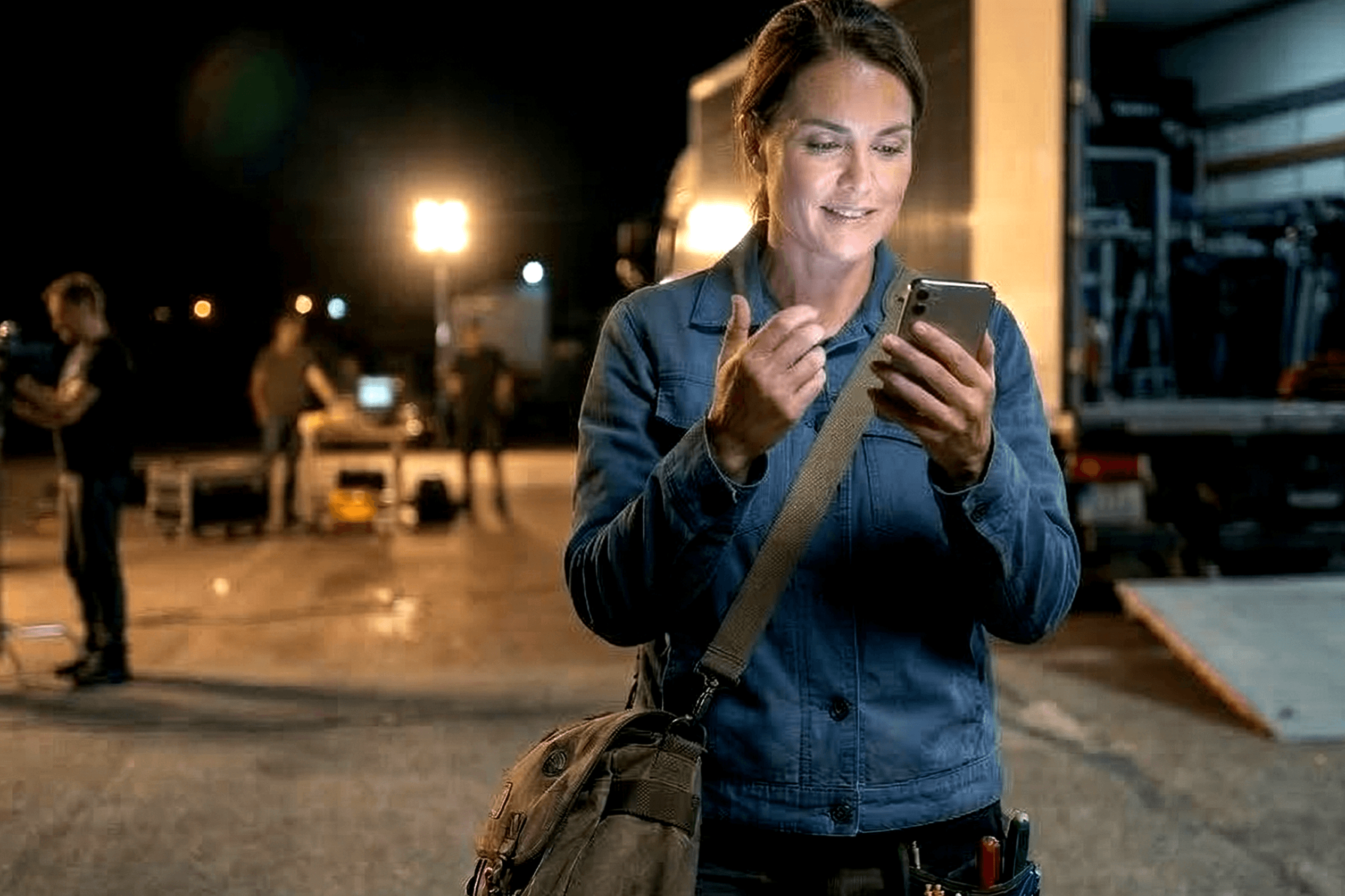 Film crew member using FilmInvoice on set